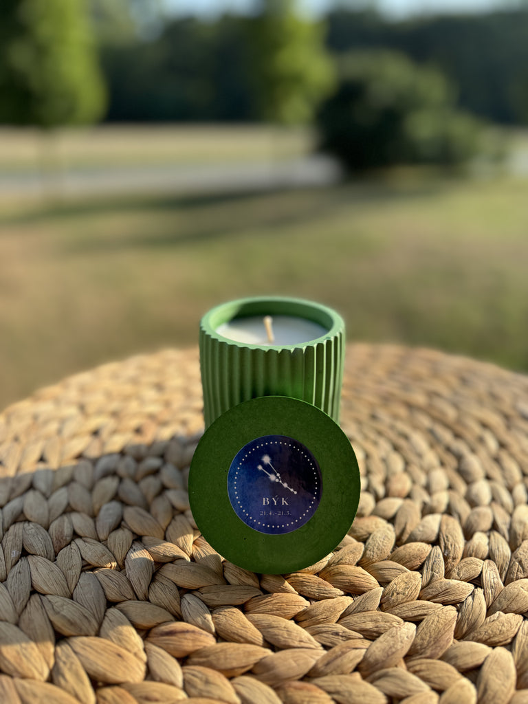 Handmade candle with the Taurus zodiac sign, green color, made from soy wax.